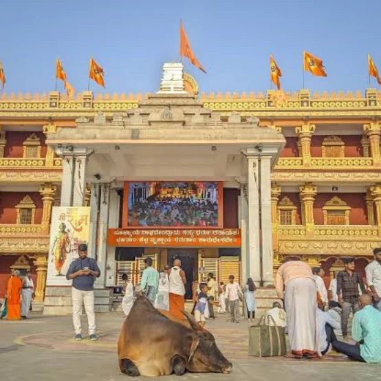 The image displays the entrance to the Sri Raghavendra Swamy Matha, a significant pilgrimage destination located in Mantralayam, Andhra Pradesh.